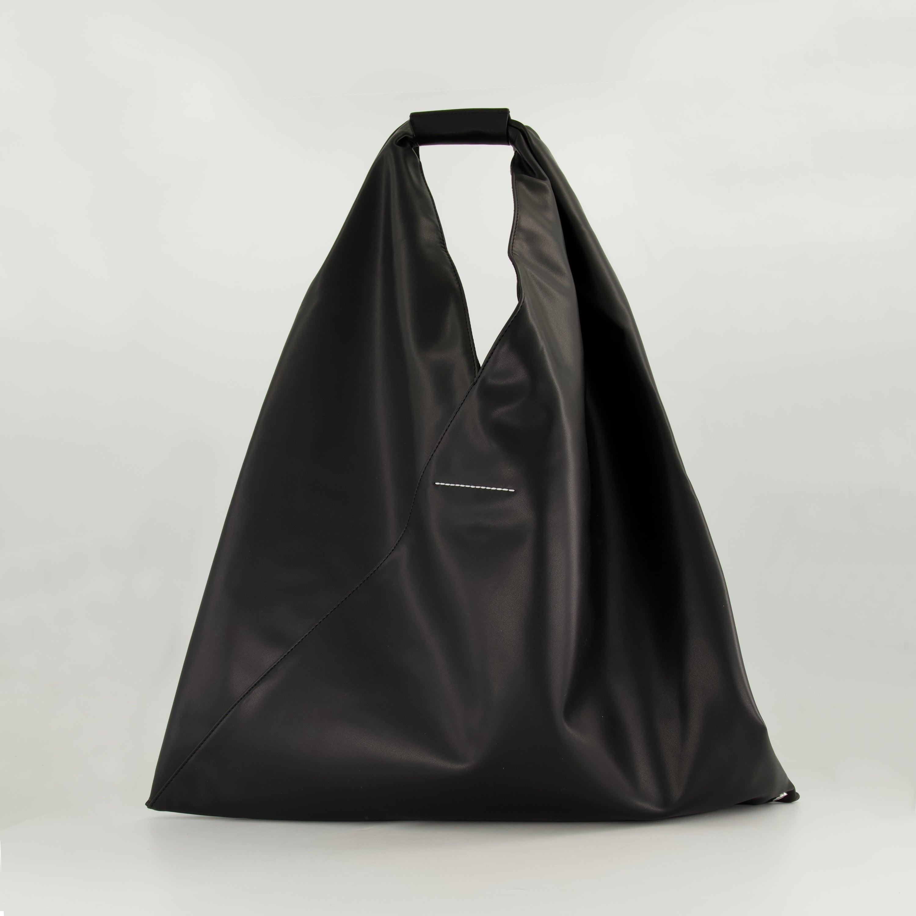 black leather bag, triangular bag, MM6 accessories, Autumn Winter 2025 collection, designer tote