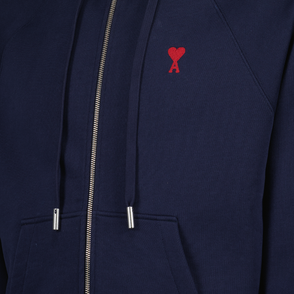 ネイビーのジップアップスウェットシャツ