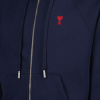 ネイビーのジップアップスウェットシャツ