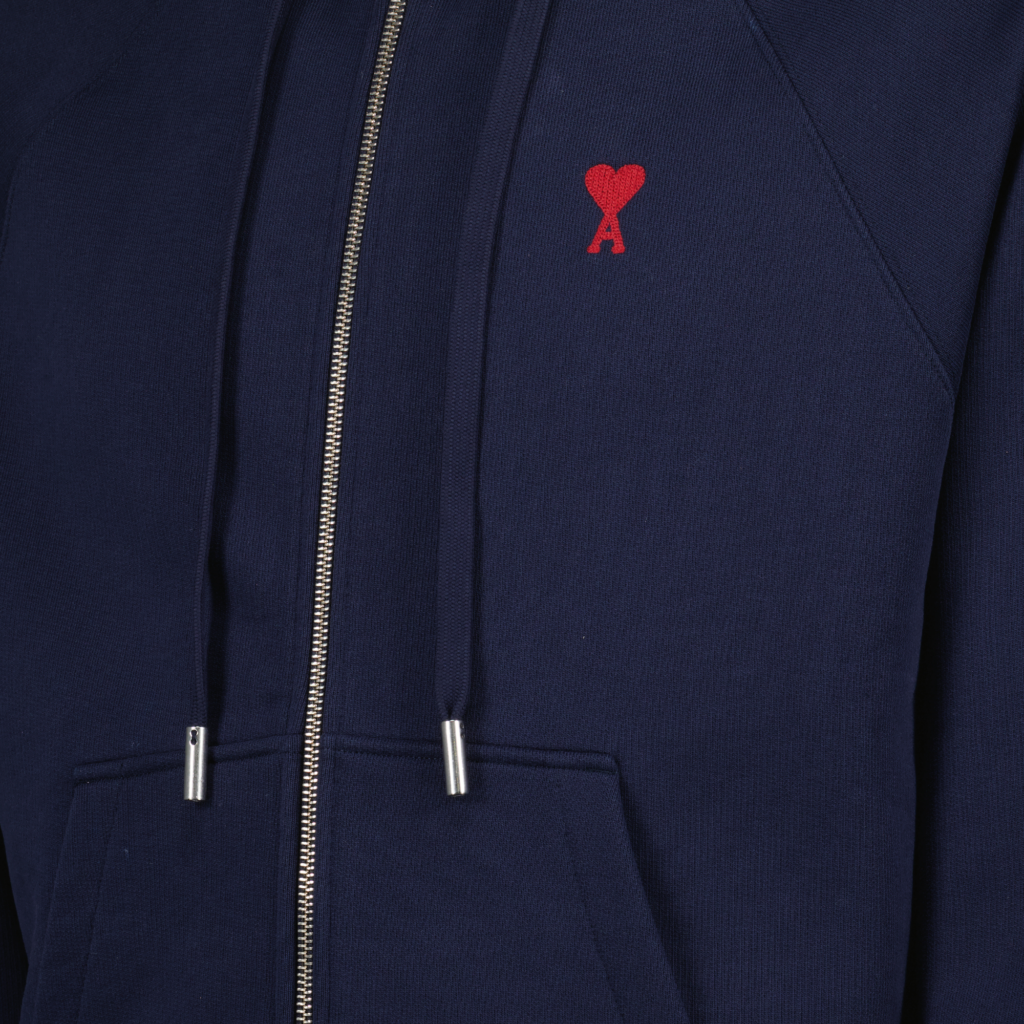 ネイビーのジップアップスウェットシャツ