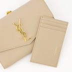 Image of Uptown Beige Chain Pouch by Saint Laurent for Women - Season Spring-Summer 2025 - Detail View 1