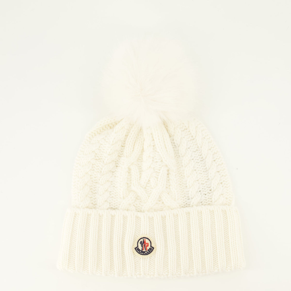 Berretto bianco in cashmere a trecce