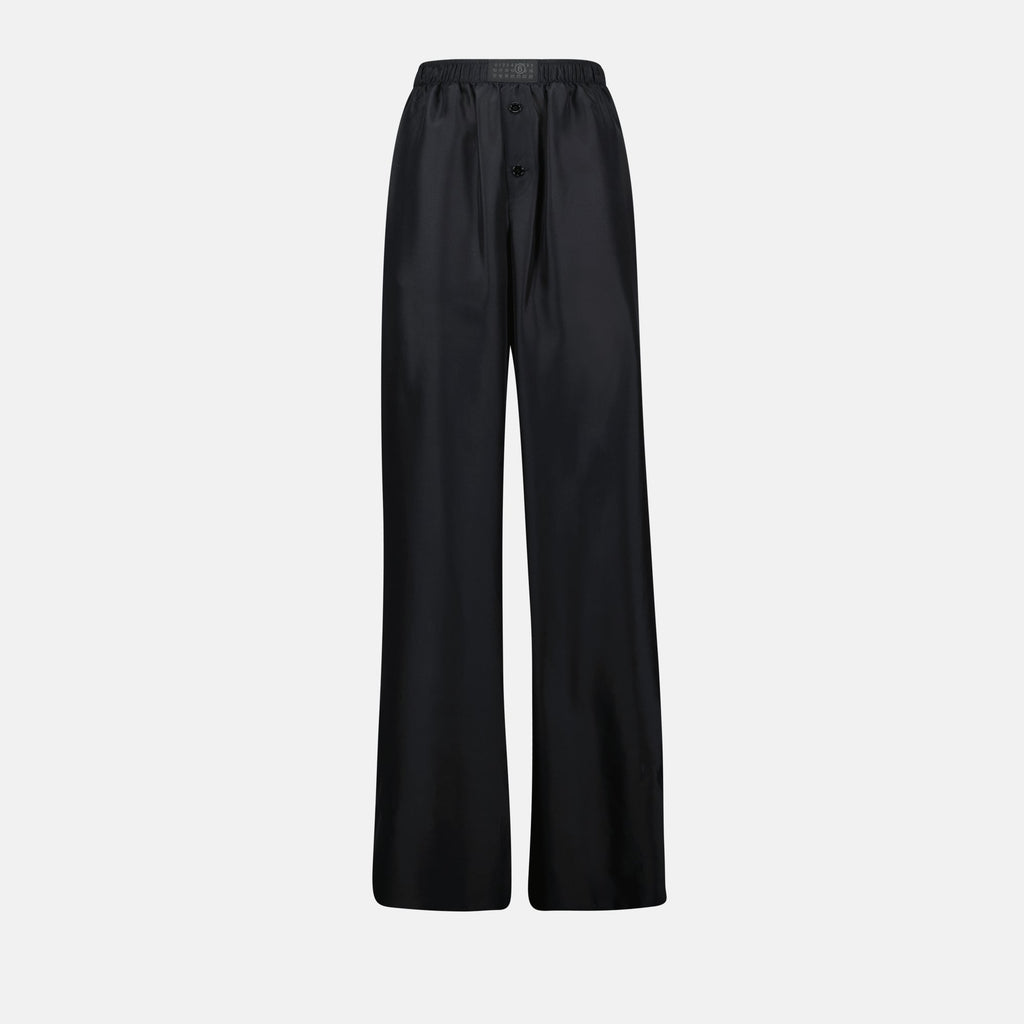 Image de pantalons en soie noire avec taille élastique par Mm6 pour femmes - Saison Printemps-Été 2025 - Vue de face