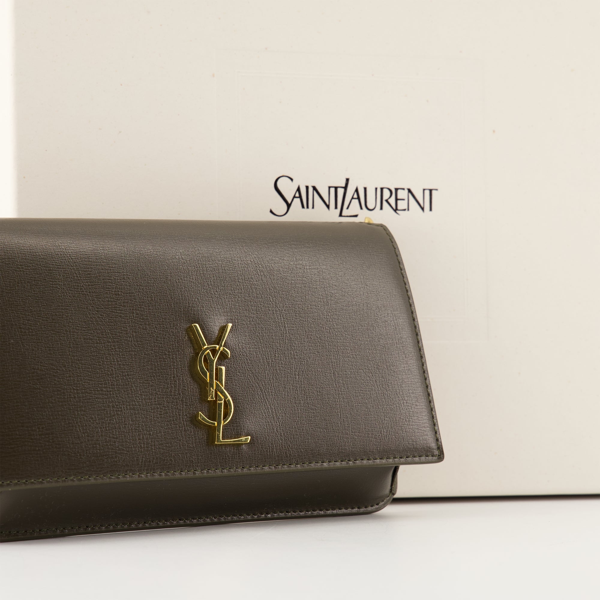 Saint Laurent phone pouch, khaki leather accessory, smooth calf leather pouch, Fall-Winter 2025 collection, detachable shoulder strap