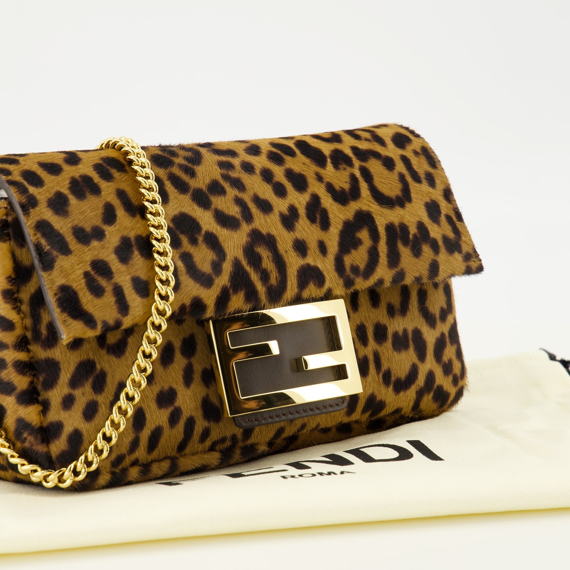 Fendi baguette bag, leopard print accessory, luxury handbag, detachable strap, calf leather bag