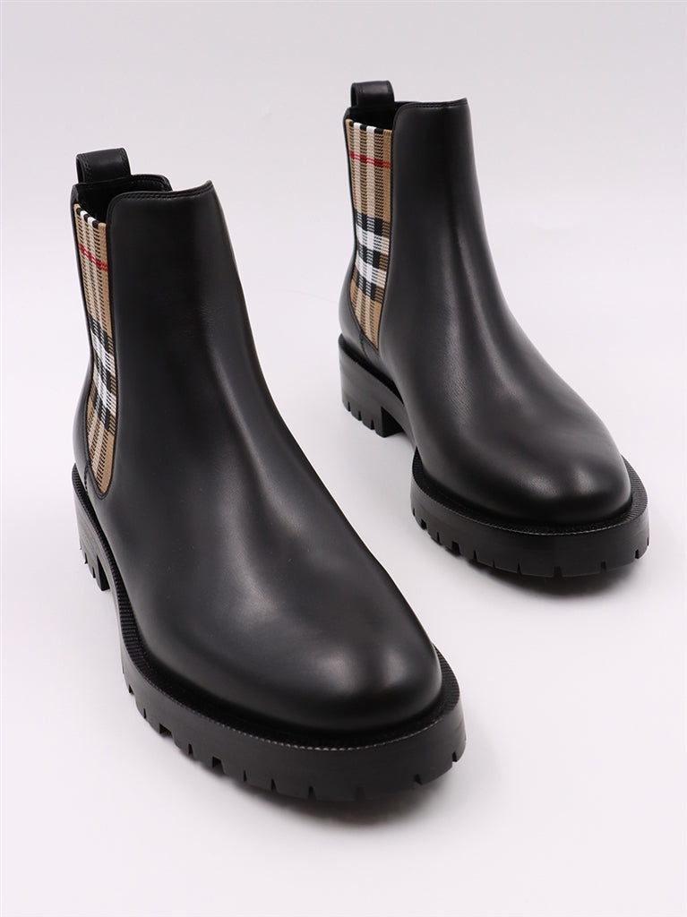 Burberry Chelsea boots, Women's luxury boots, Black leather boots, High-end footwear, Designer Chelsea boots