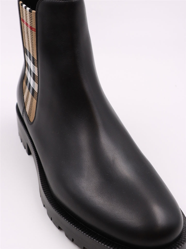 Burberry Chelsea boots, Women's luxury boots, Black leather boots, High-end footwear, Designer Chelsea boots