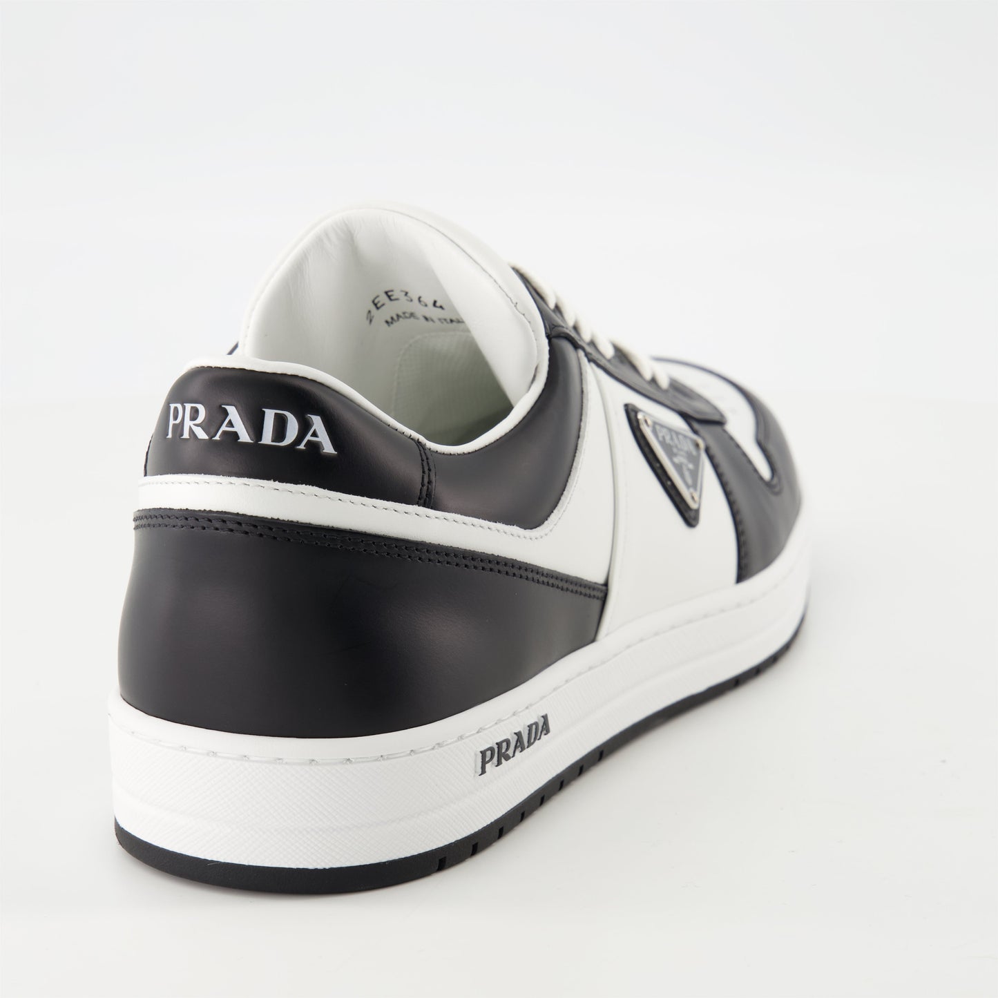 leather sneakers, black and white, Prada, rubber sole, triangle logo