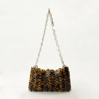 Iconic 1969 bag, tortoise shell print, Rabanne tote, resin and metal bag, Autumn-Winter 2024 collection