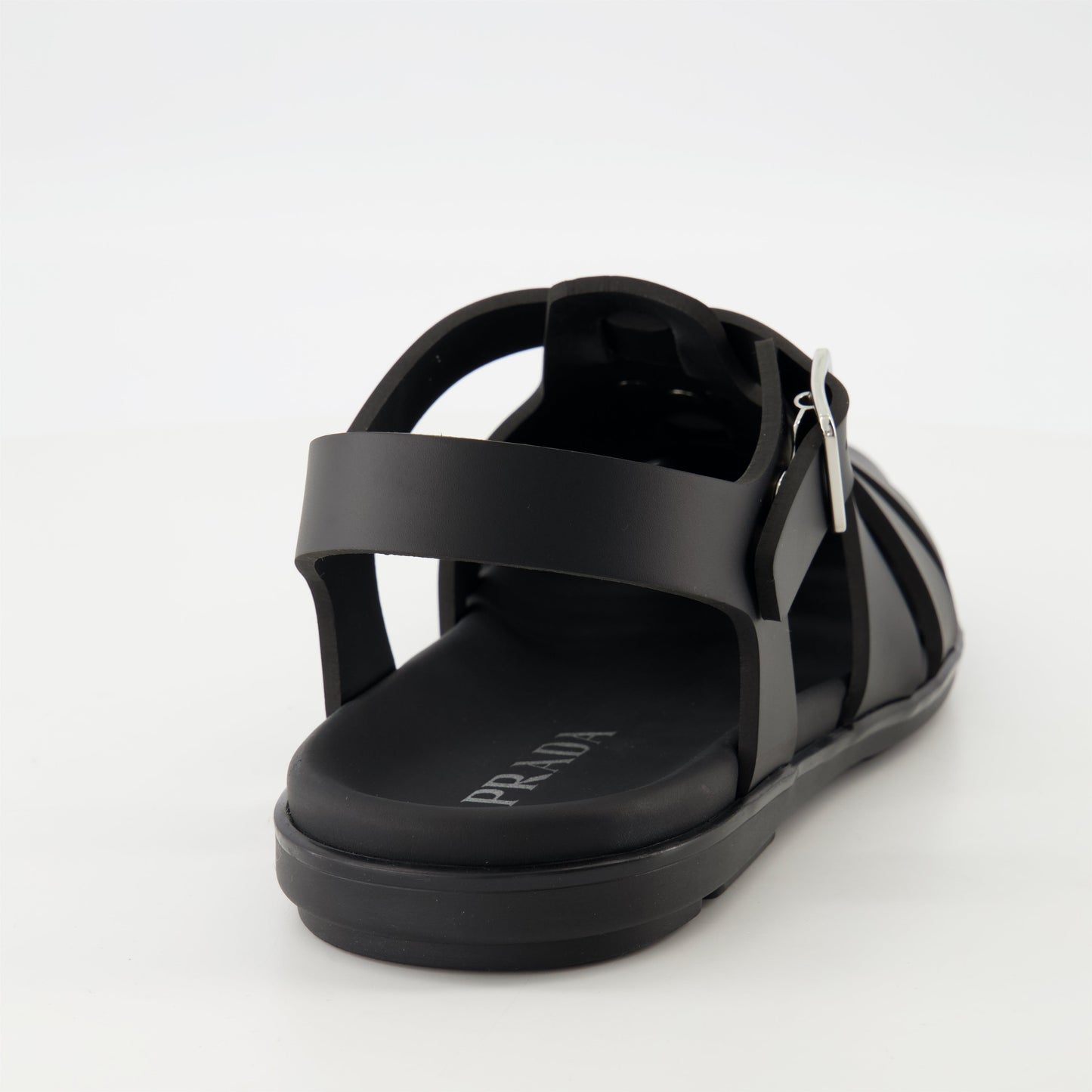 fisherman sandals, black rubber sandals, Prada footwear, adjustable sandals, casual footwear