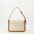 Imagen de un bolso de cuero y algodón de Saint Laurent para mujeres - Temporada Primavera-Verano 2025 - Vista trasera