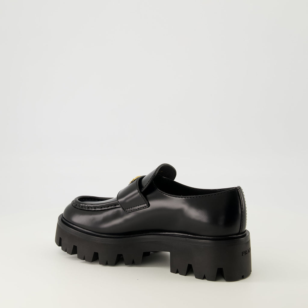 Prada moccasins, black leather shoes, slip-on footwear, rounded toe moccasins, Autumn-Winter collection