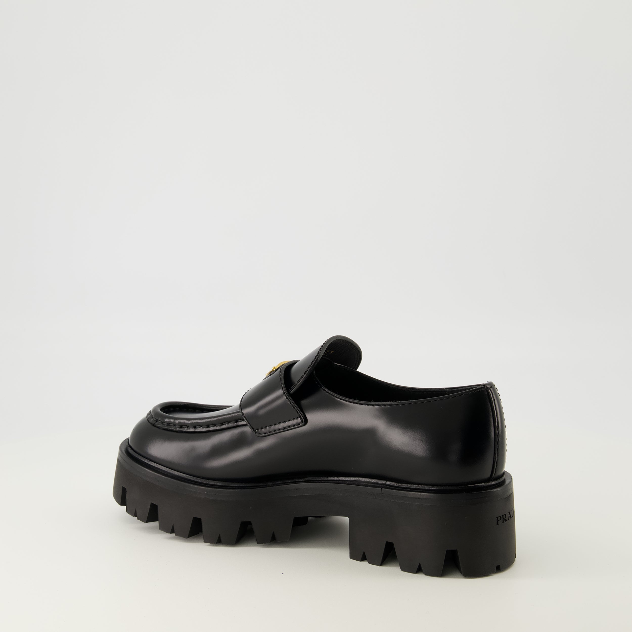 Prada moccasins, black leather shoes, slip-on footwear, rounded toe moccasins, Autumn-Winter collection