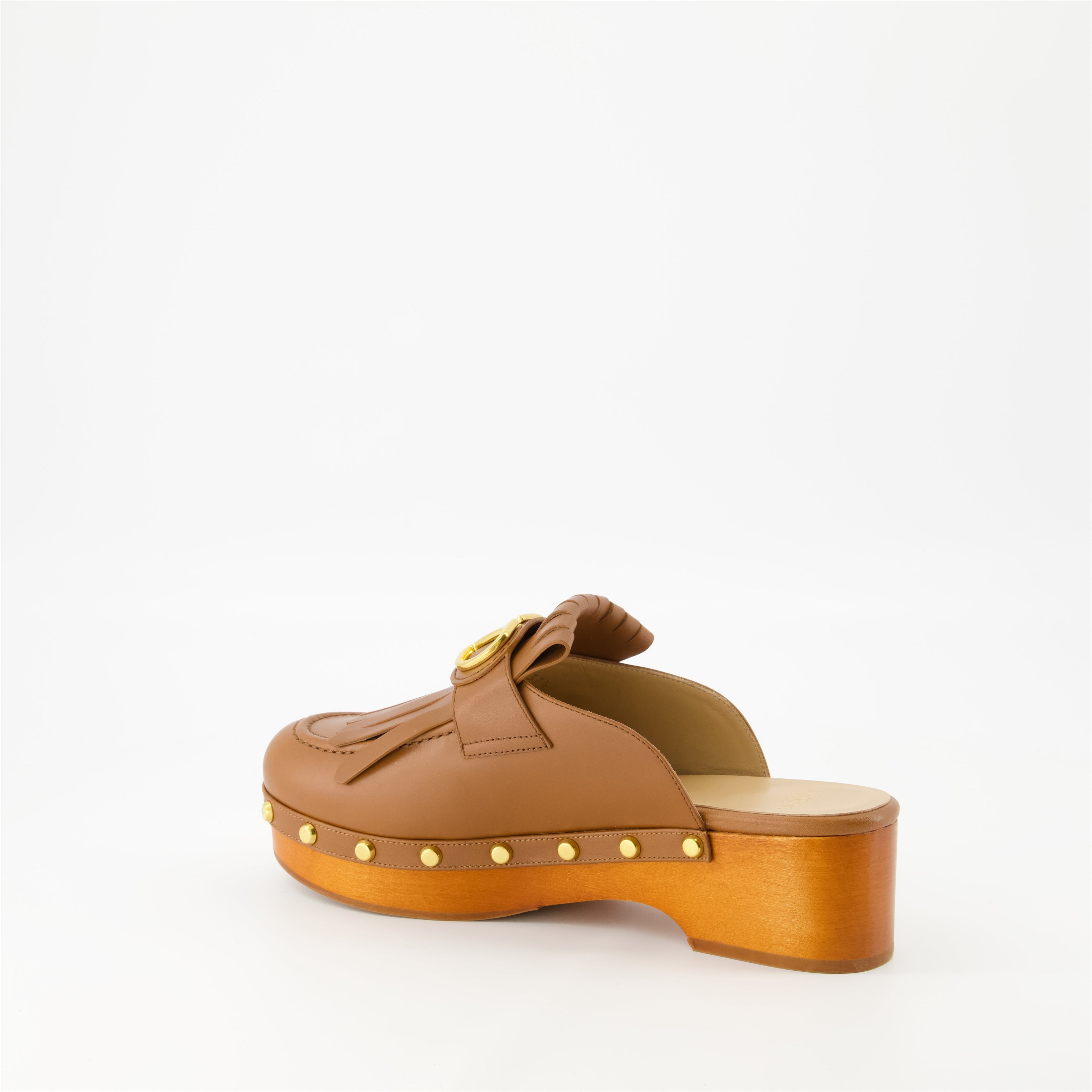 leather clogs, VLogo shoes, luxury footwear, fringe design, Italian fashion