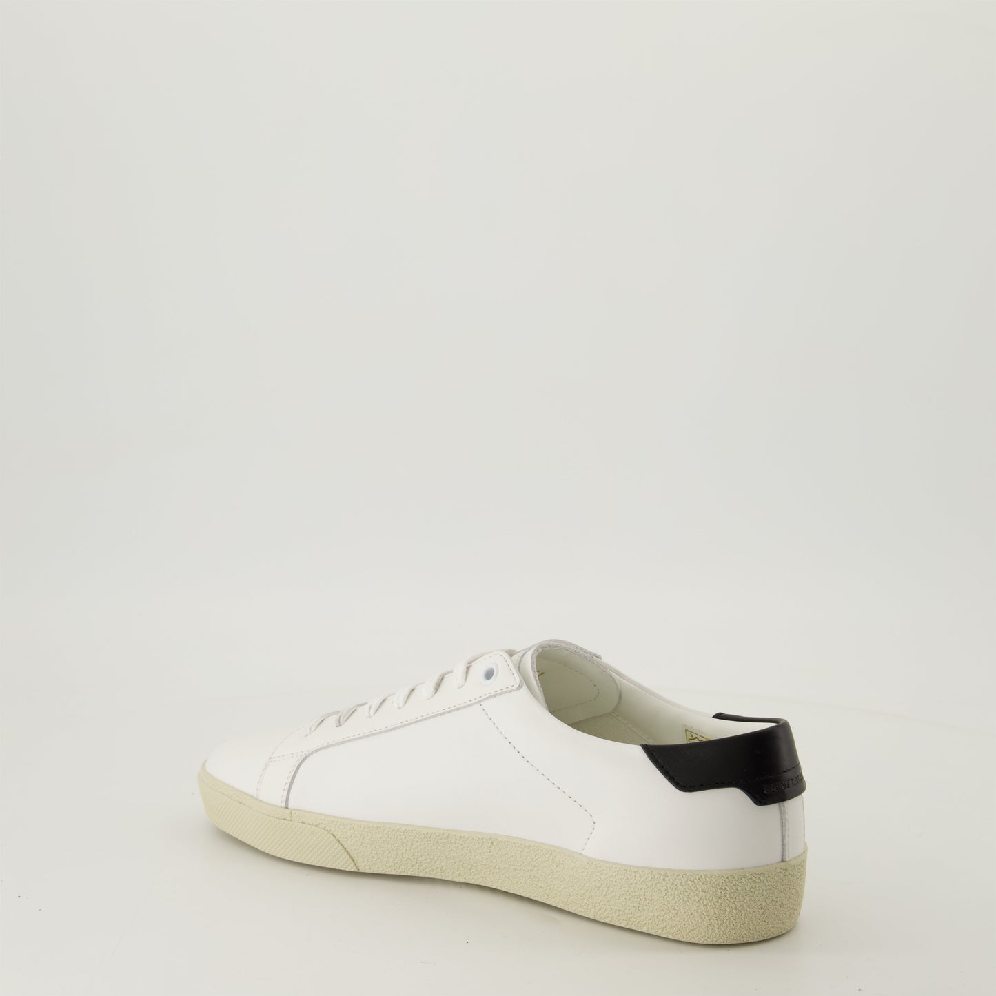 smooth leather sneakers, round toe design, gum sole sneakers, white leather sneakers, logo accent shoes