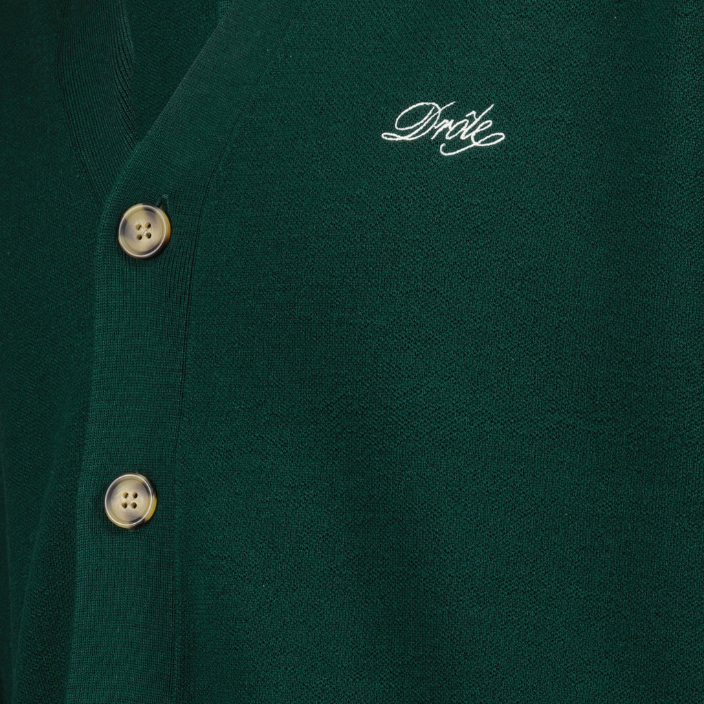 green cardigan, detachable sleeves, wool cardigan, button closure, embroidered logo