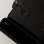 black leather bag, adjustable strap, elegant handbag, compartmentalized bag, stylish accessory