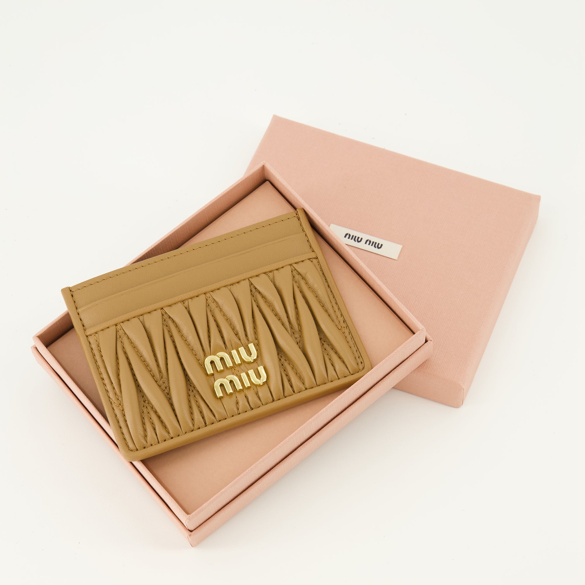 quilted leather cardholder, Miu Miu cardholder, brown leather accessory, luxury cardholder, women's leather wallet