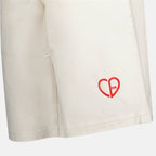 Dior shorts, white denim shorts, CD Heart Bermuda, luxury menswear, Dior Autumn-Winter 2024