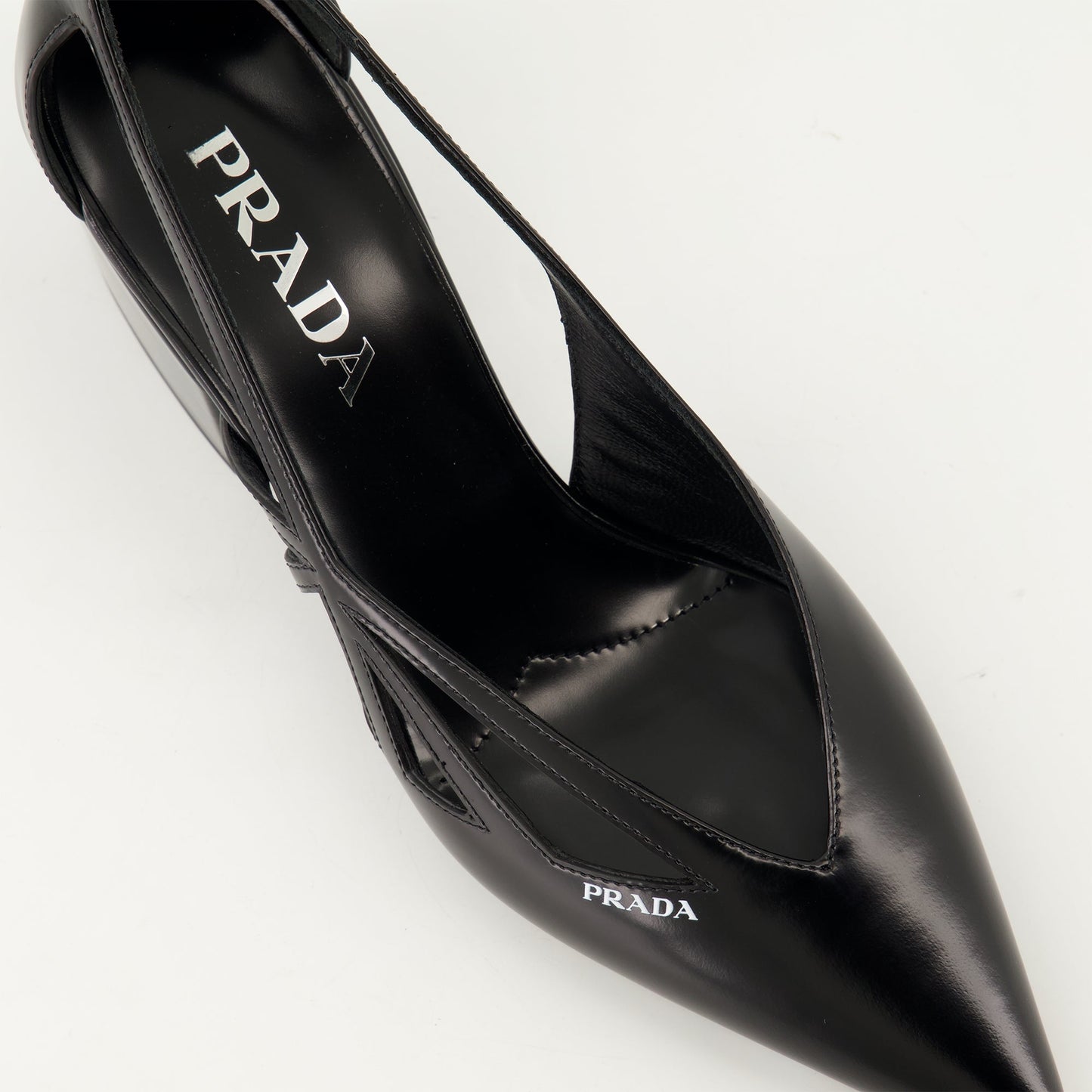 black leather pumps, pointed toe shoes, Prada pumps, cut-out pumps, luxury footwear