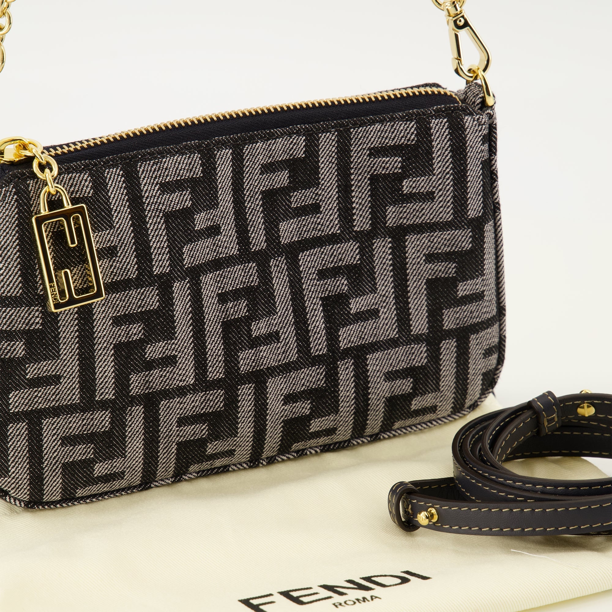 Fendi denim pouch, designer accessories, luxury bags, high-end fashion, autumn-winter collection 2025