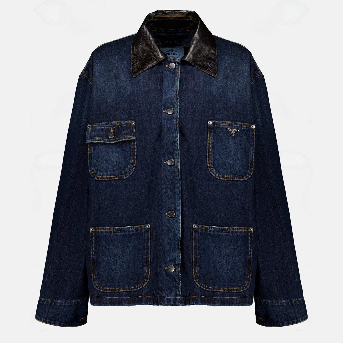 Mørkeblå denim- og skinnjakke