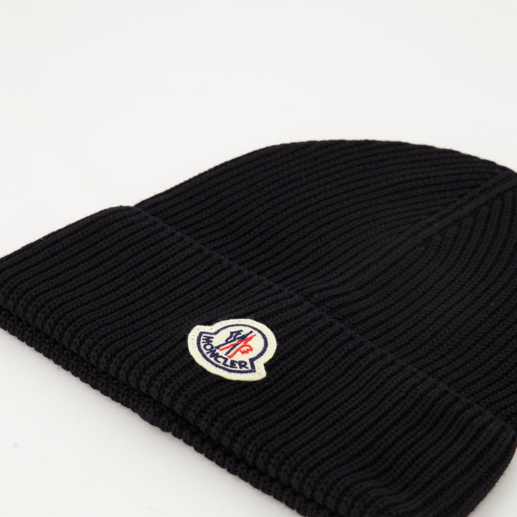 black knit bonnet, Moncler logo, Spring-Summer 2025, ribbed cotton accessory, stylish headwear