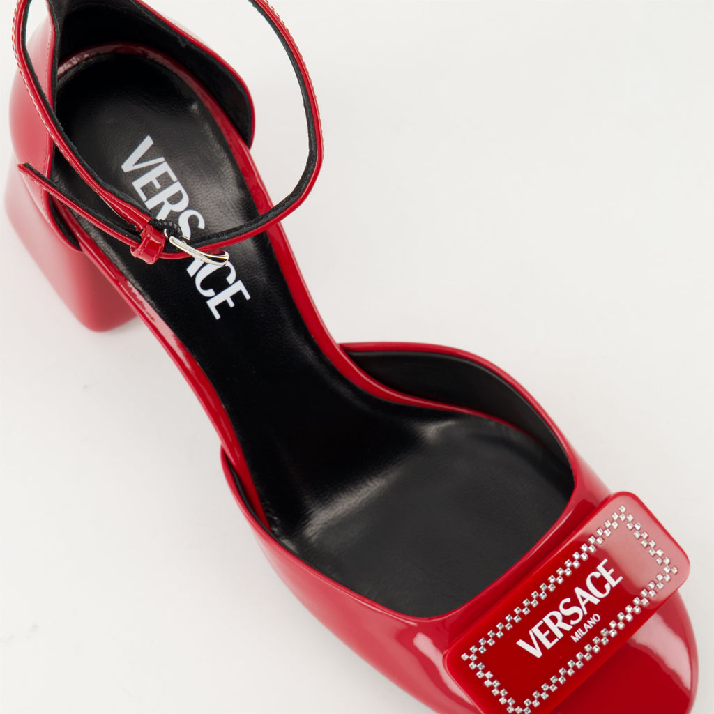 red patent leather pumps, Versace footwear, adjustable ankle strap, smooth leather shoes, Spring-Summer 2025 collection