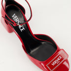 red patent leather pumps, Versace footwear, adjustable ankle strap, smooth leather shoes, Spring-Summer 2025 collection