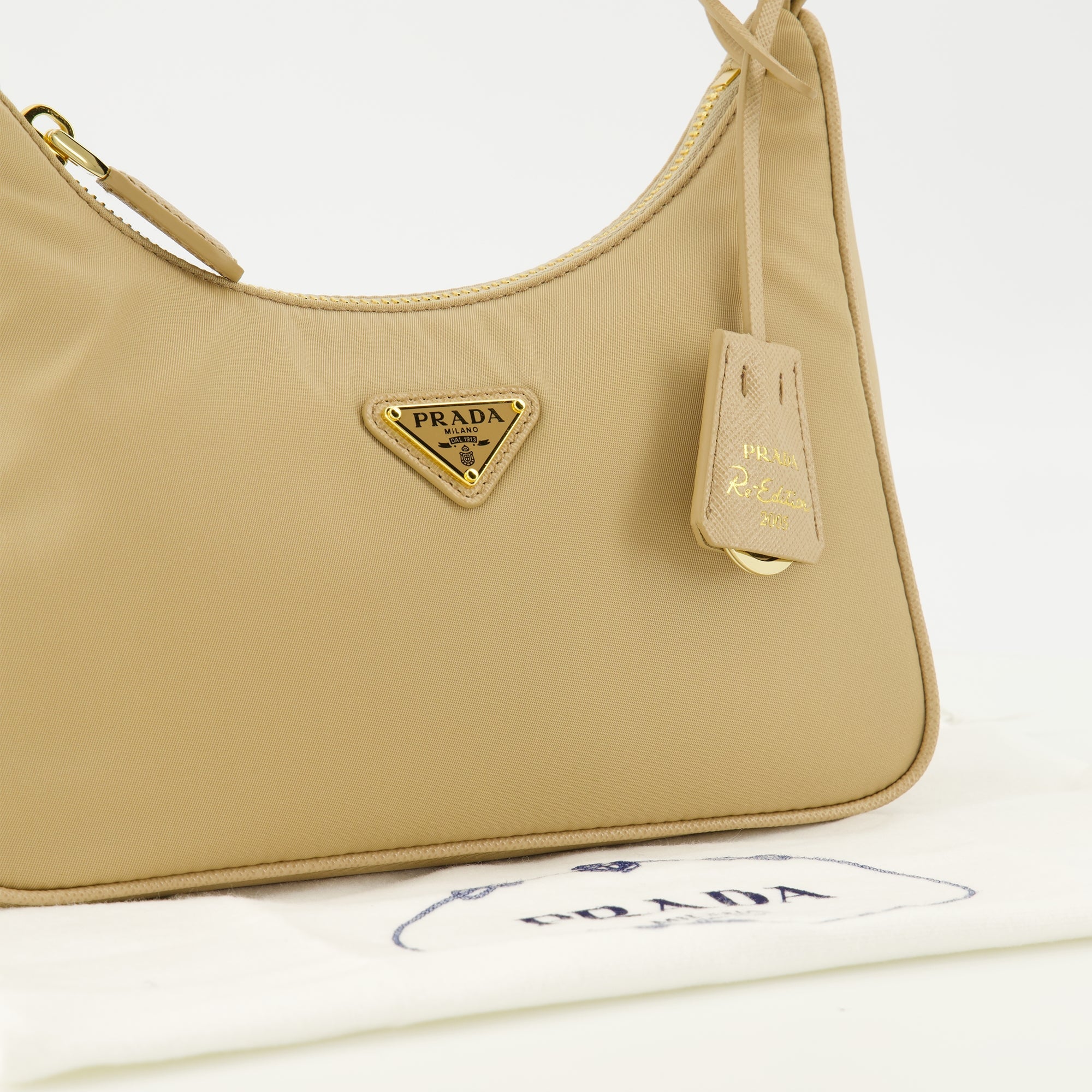 Prada, Mini Sac Réédition 2005, beige nylon bag, designer accessories, sustainable fashion