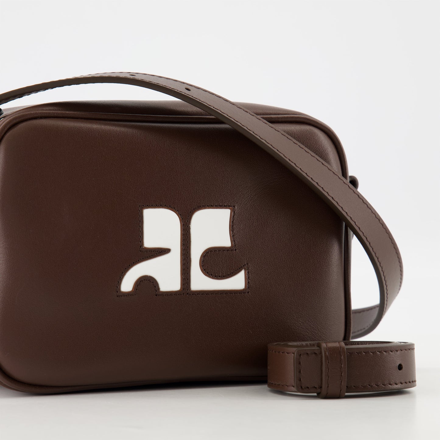 Camera bag, brown leather bag, Courrèges bag, unisex leather accessory, luxury fashion bag