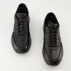 black sneakers, Tod's shoes, leather footwear, stylish sneakers, casual elegance