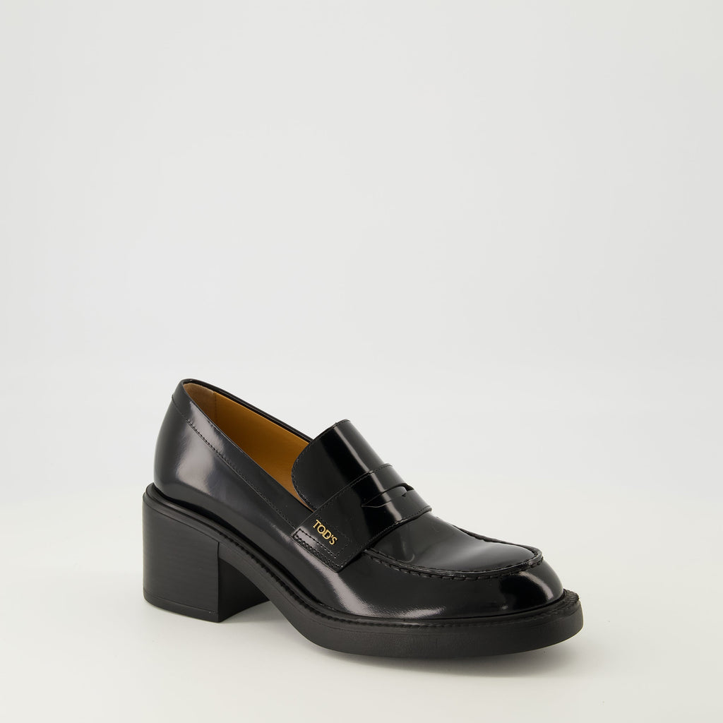black leather moccasins, Tod's footwear, elegant slip-on shoes, autumn winter collection, women's moccasins