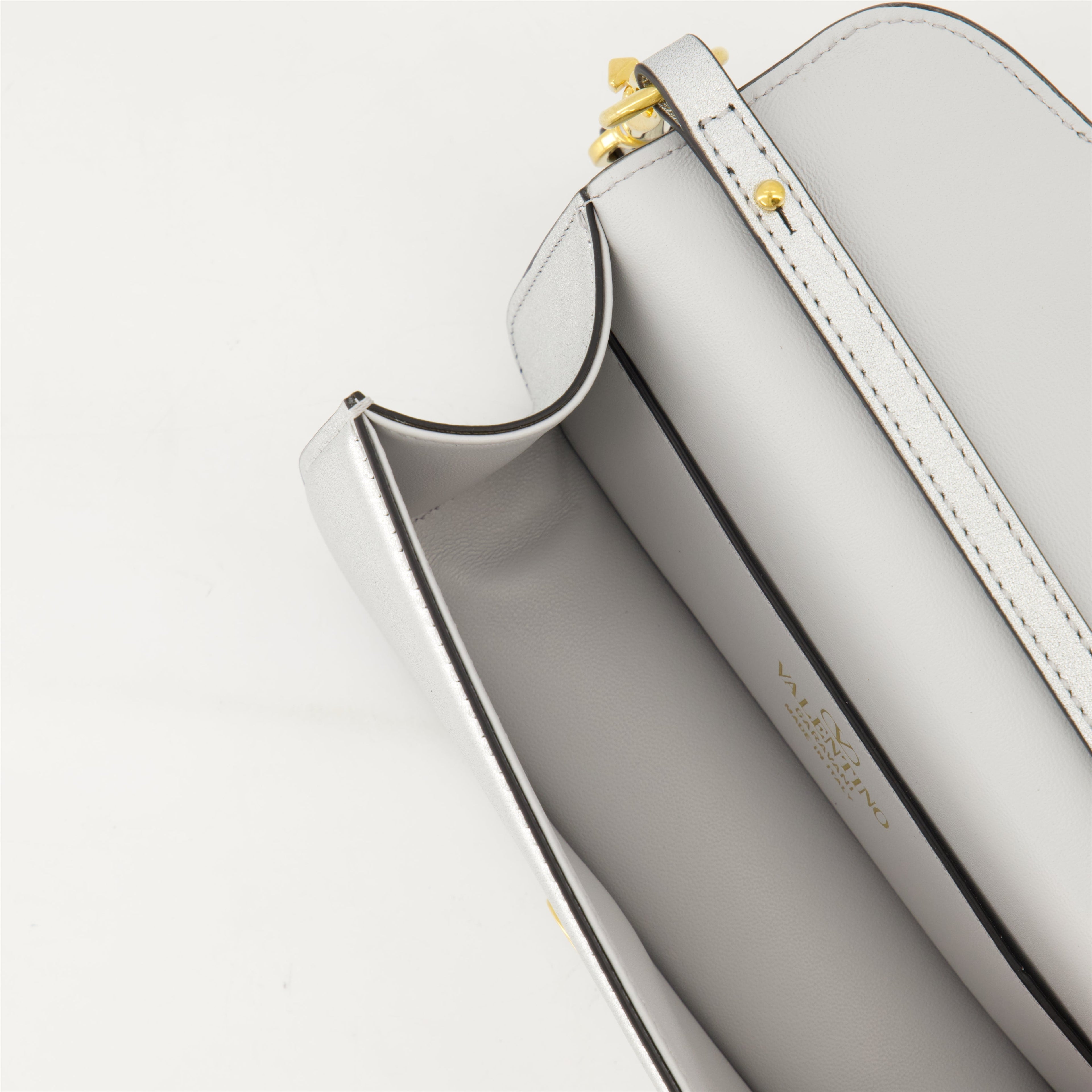 VLogo bag, Valentino Garavani, leather shoulder bag, silver handbag, Swarovski accents