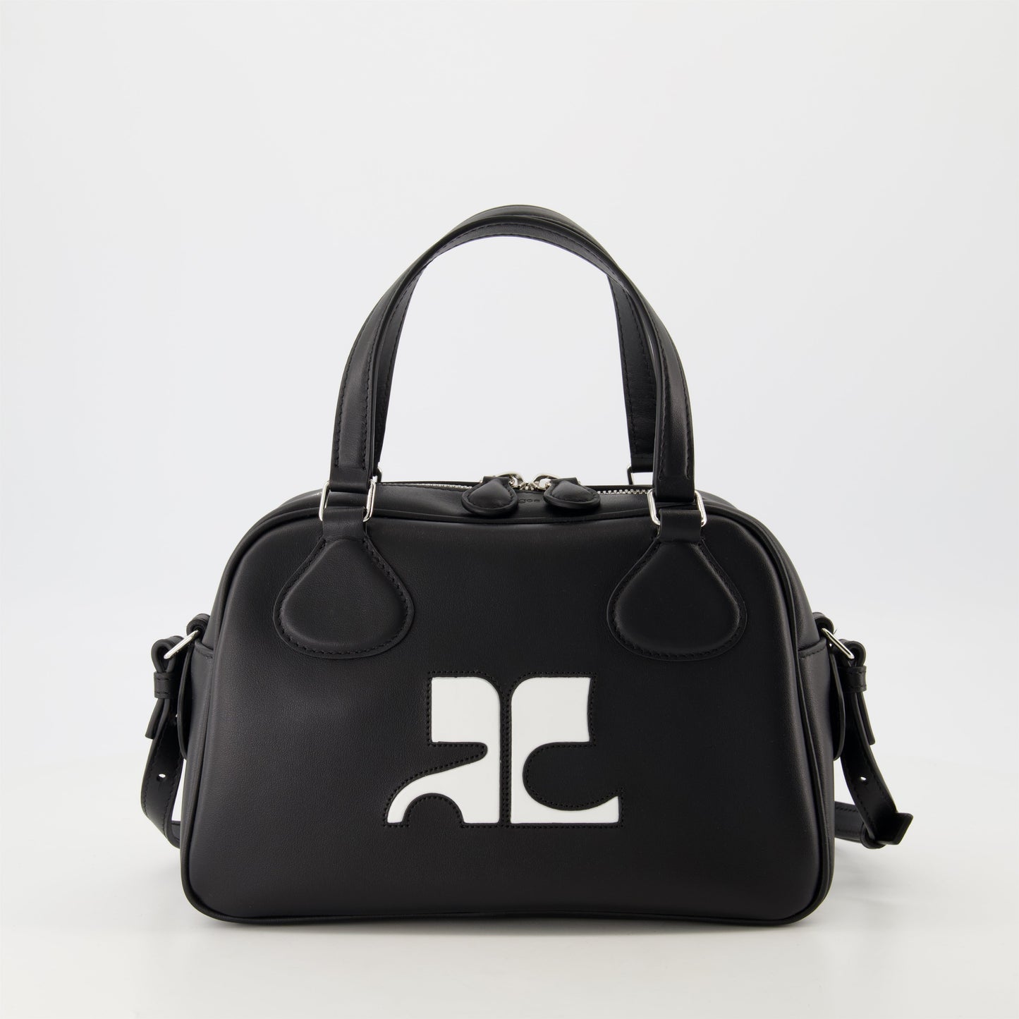 black leather bag, unisex bowling bag, Courrèges leather bag, luxury accessories, designer bags