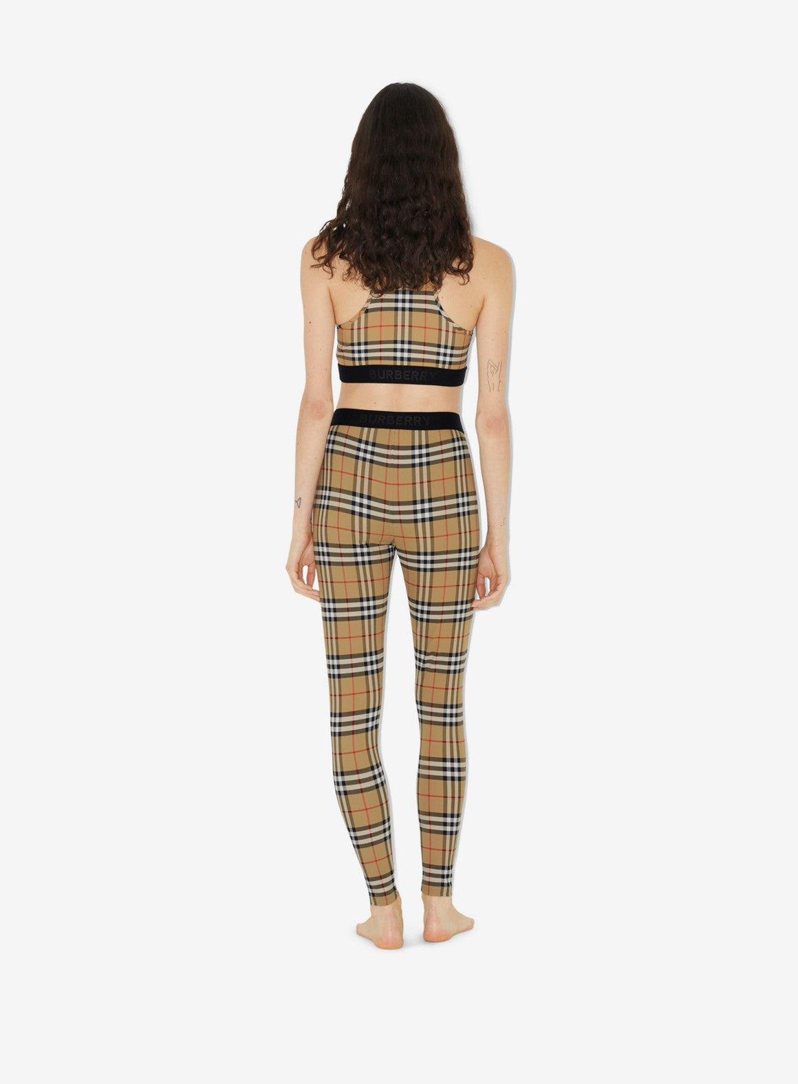 1. Burberry leggings
2. Women's fashion
3. Vintage check pattern
4. Luxury apparel
5. High-end leggings