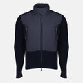 Immagine del cardigan bi-materiale blu di Moncler Grenoble per uomini - Stagione primavera-estate 2026 - Vista frontale