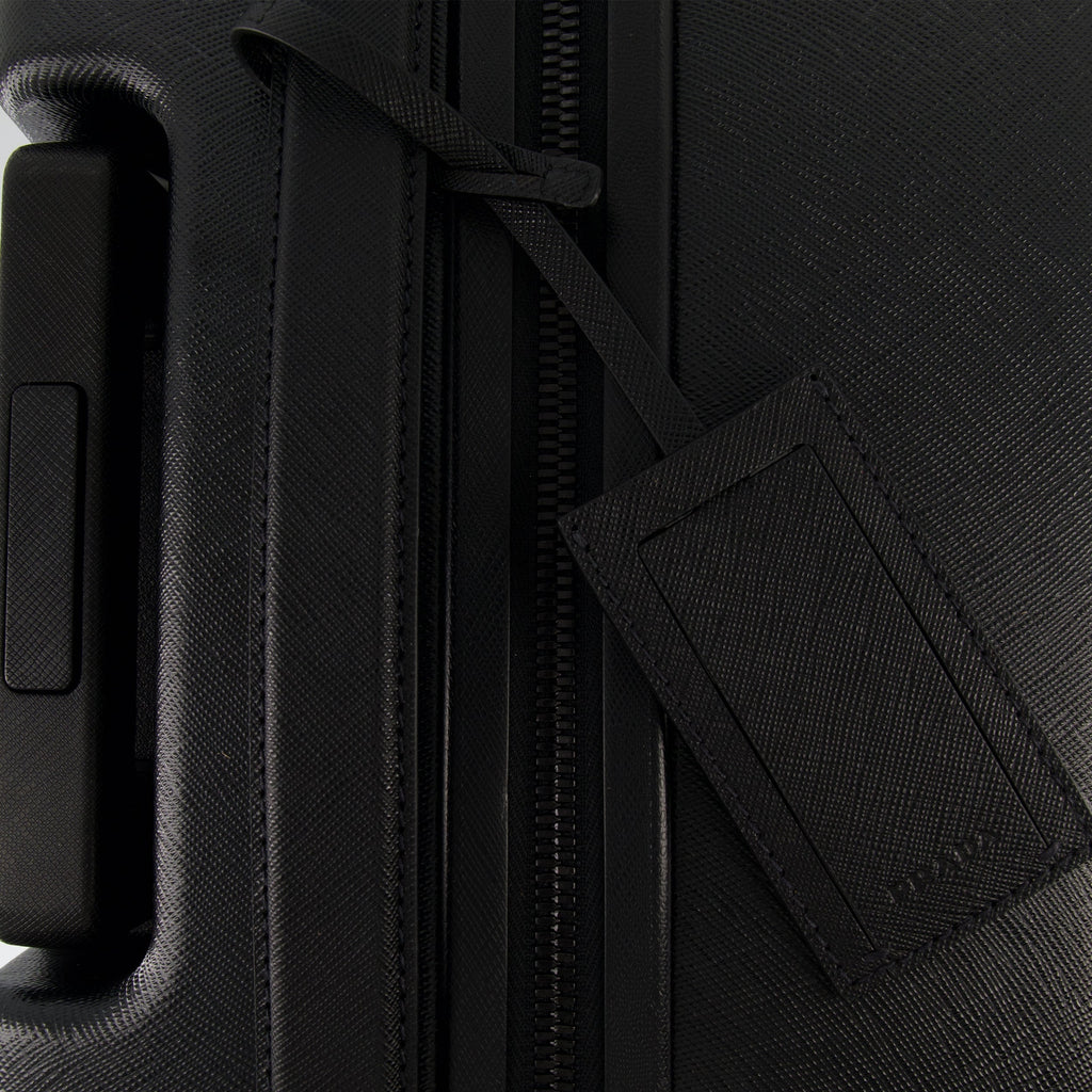 leather rolling luggage, Prada, travel accessories, cabin luggage, luxury travel bag