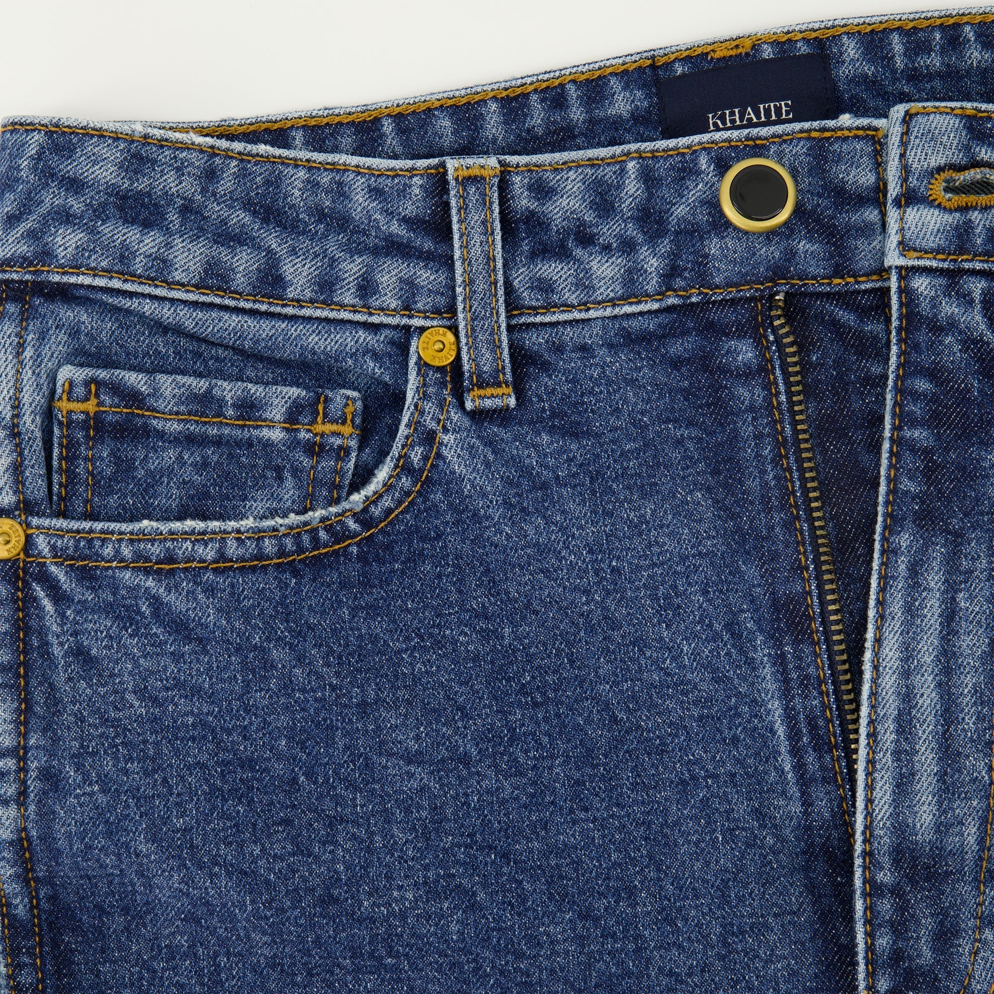 Khaite denim jeans, high waist jeans, straight cut jeans, five-pocket design, denim fashion