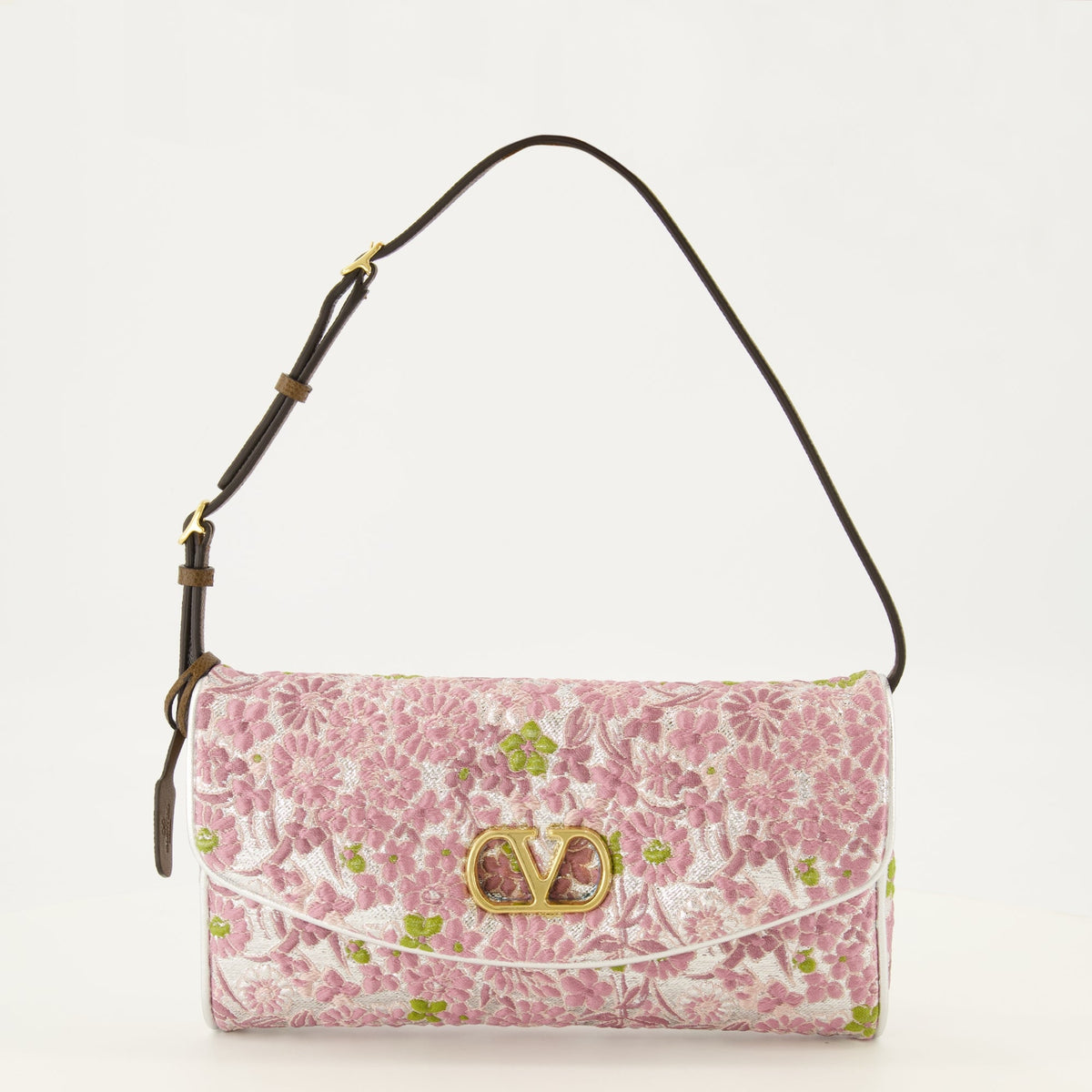 Kleine Tasche aus rosafarbenem Jacquard