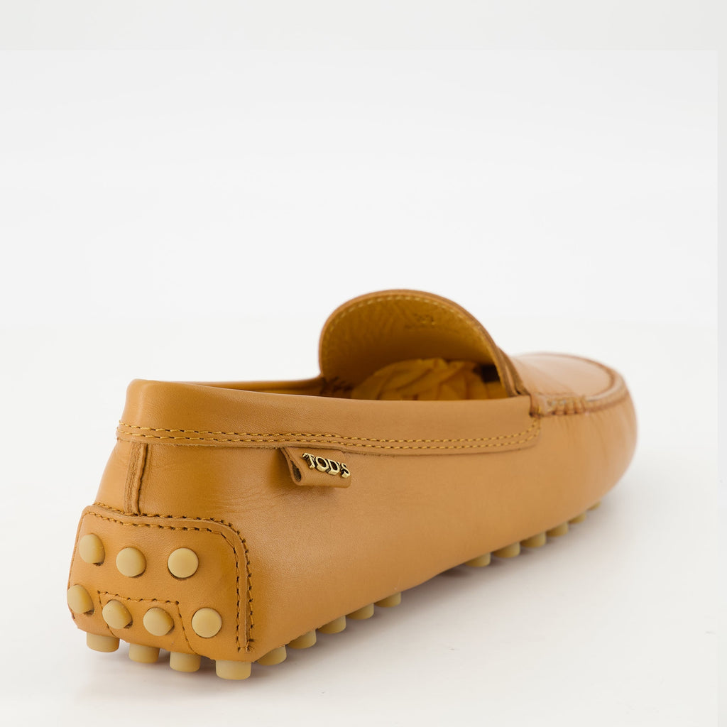 Tod's loafers, Gommino loafers, leather footwear, luxury loafers, brown leather shoes