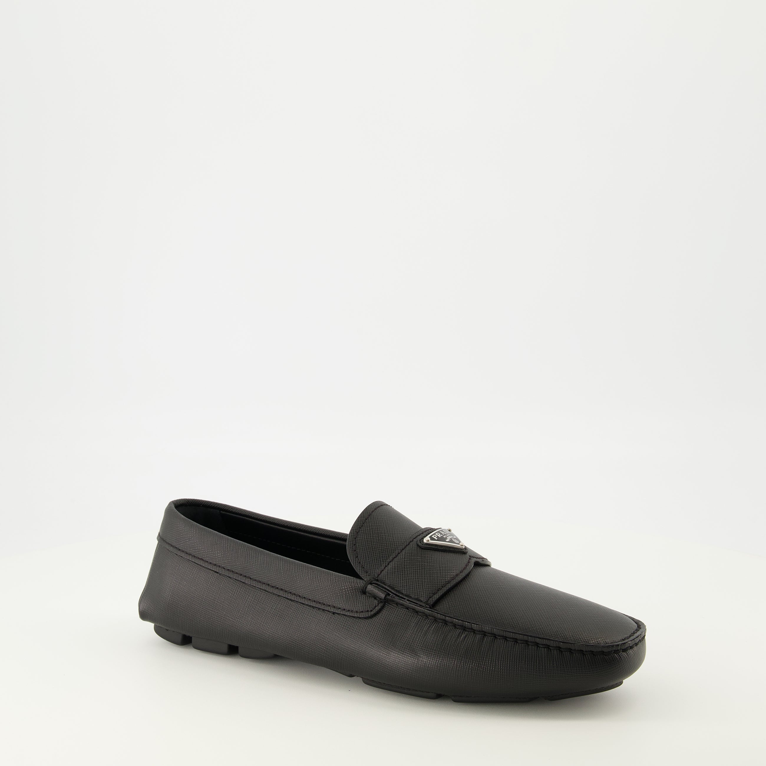 Image of Prada Black Leather Moccasins by Prada for Men - Season Spring-Summer 2026 - Front Right Three-Quarter View
