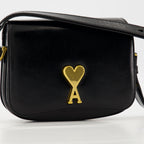 black leather bag, AMI Paris bag, unisex accessories, chic leather handbag, stylish bag