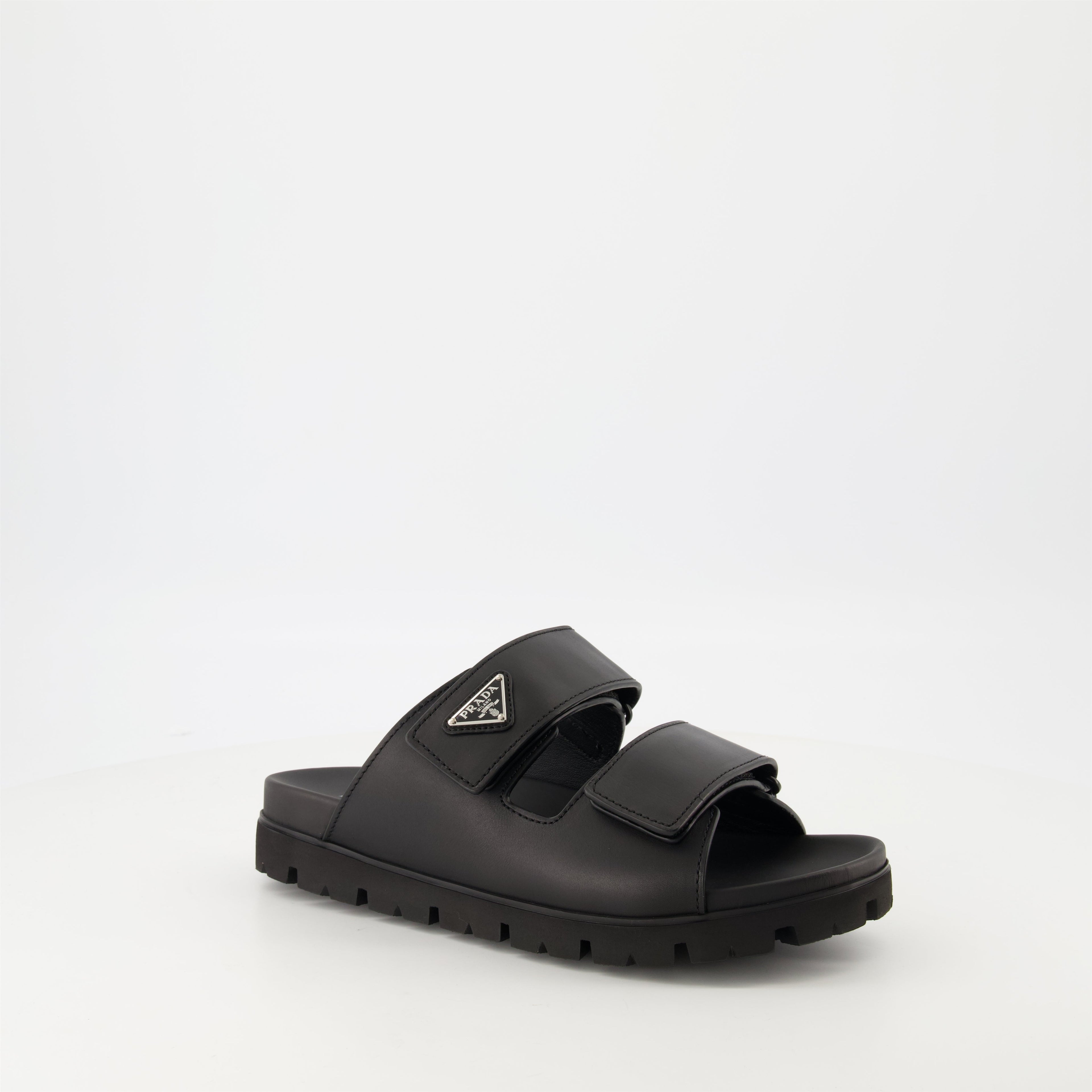 black leather slides, Prada slides, men's leather footwear, stylish casual shoes, comfortable leather sandals