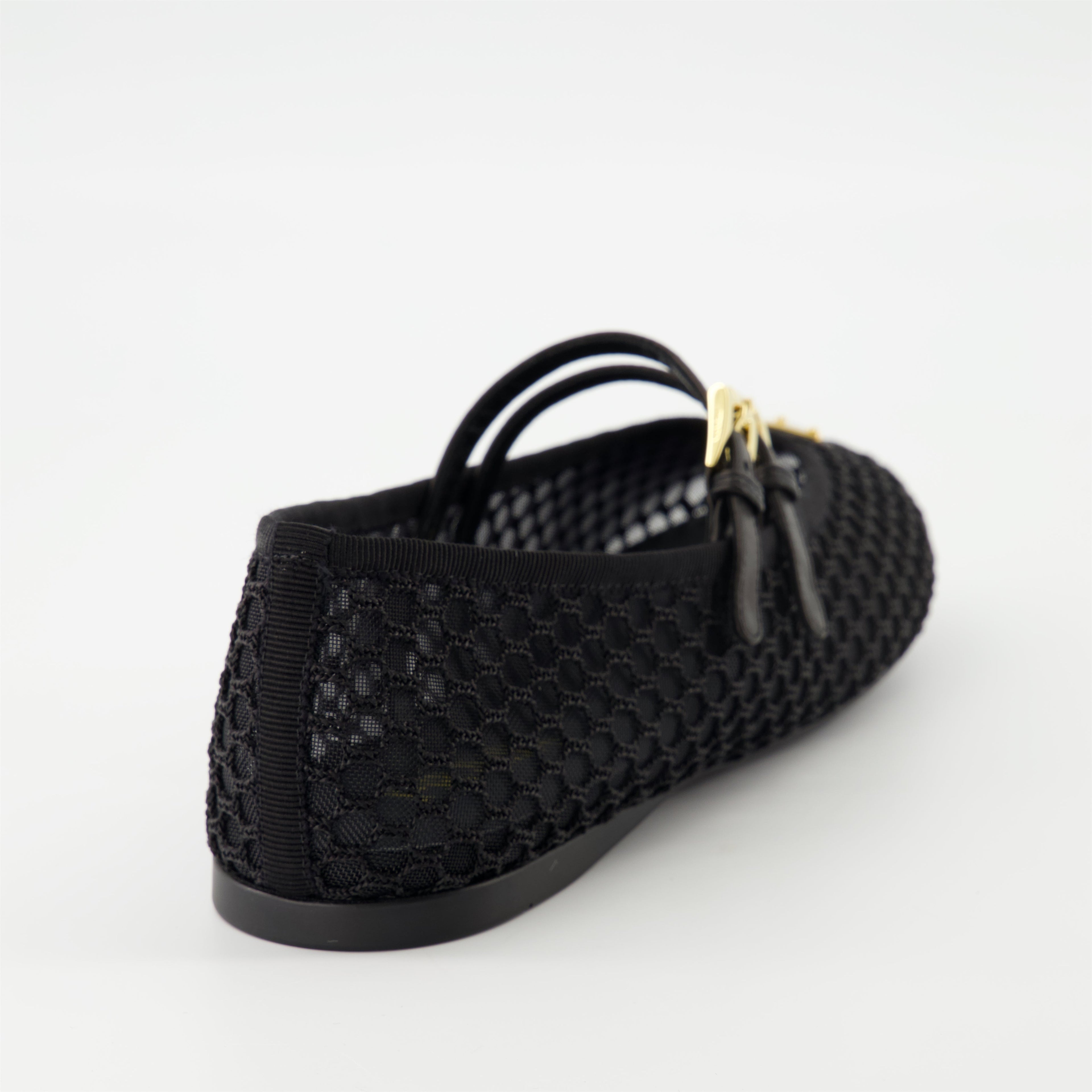 black mesh ballerinas, Prada shoes, stylish flats, rubber sole ballerinas, adjustable strap footwear