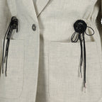 Imagen de un blazer de lana beige de Rabanne para mujeres - Temporada Primavera-Verano 2025 - Vista detallada 5