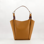 brown leather bucket bag, Tod's bag, luxury accessories, designer handbag, camel leather bag