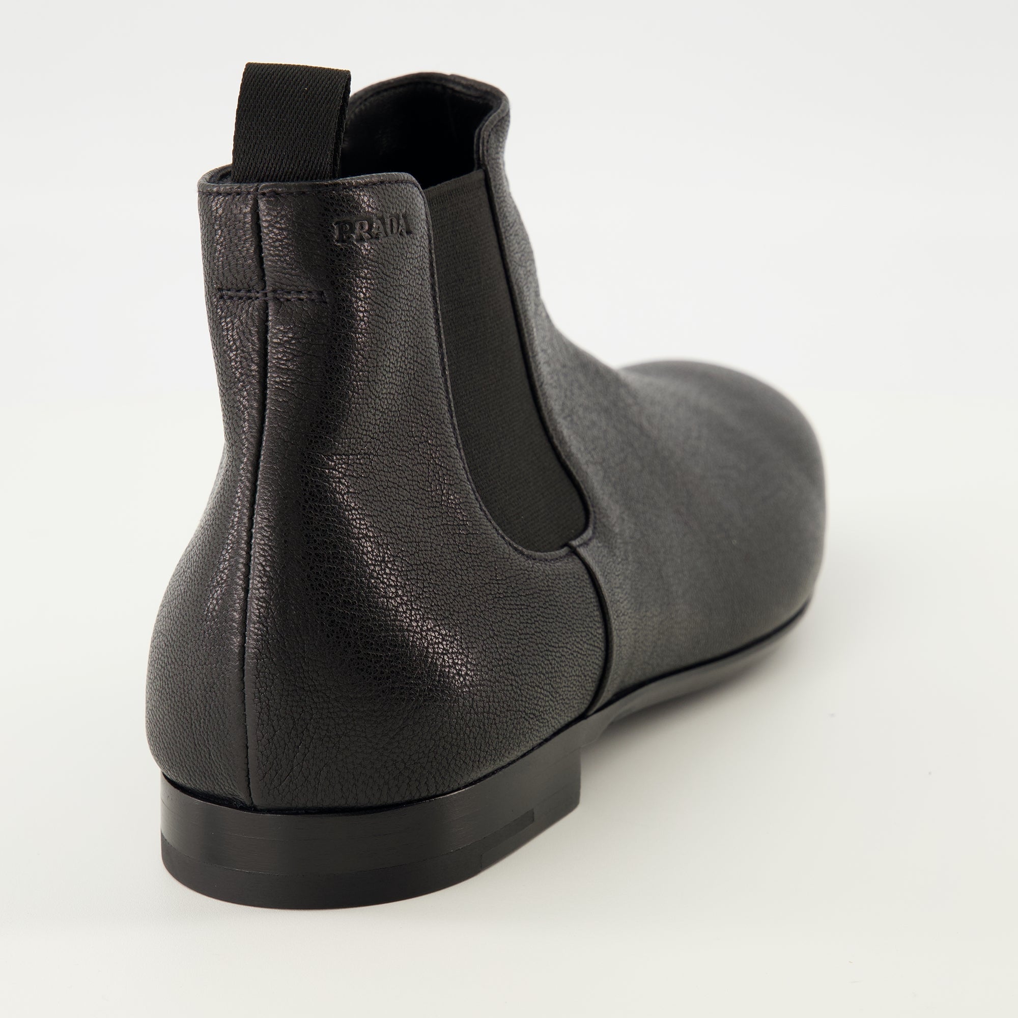 Chelsea boots, black leather boots, Prada footwear, men's boots, grained leather