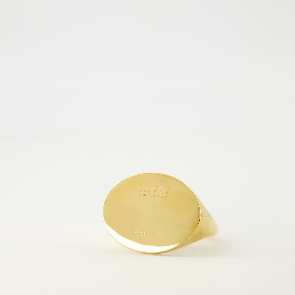 gold bracelet, Mm6 accessories, oval bracelet, engraved logo, autumn winter collection