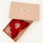 Image of Chouchou en Velours Rouge by Miu Miu for Women - Season Spring-Summer 2026 - Detail View 2